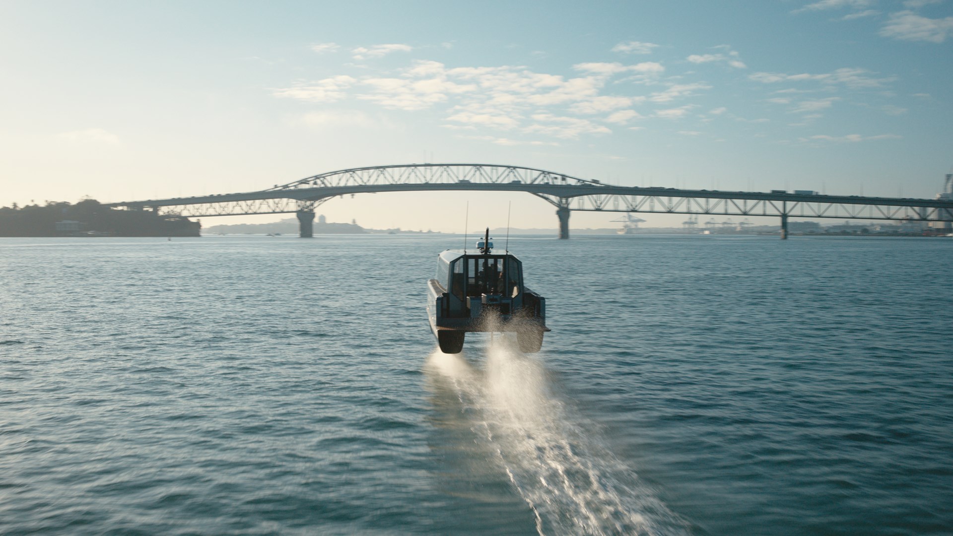 Fullers360 electric ferry under the Auckland bridge